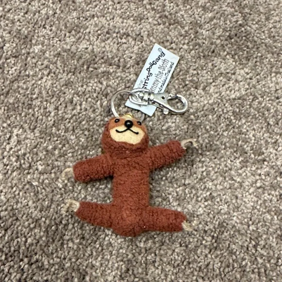 The string doll game Sammy the sloth keychain - Picture 1 of 3